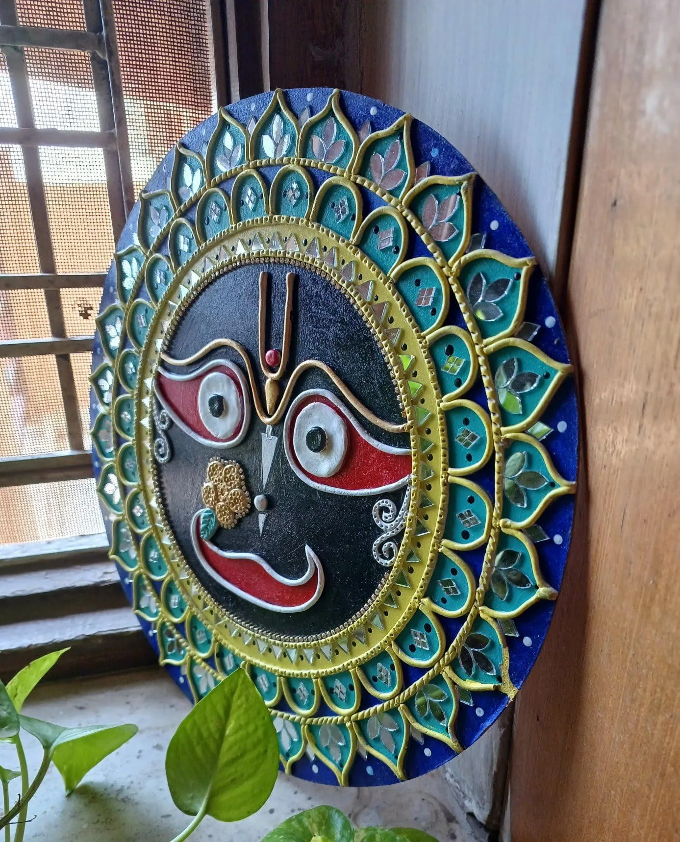 A Majestic Shreenathji Design on MDF Board with Mouldit Clay, Acrylic Paint, Mirrors – 12x12 Decorative Item