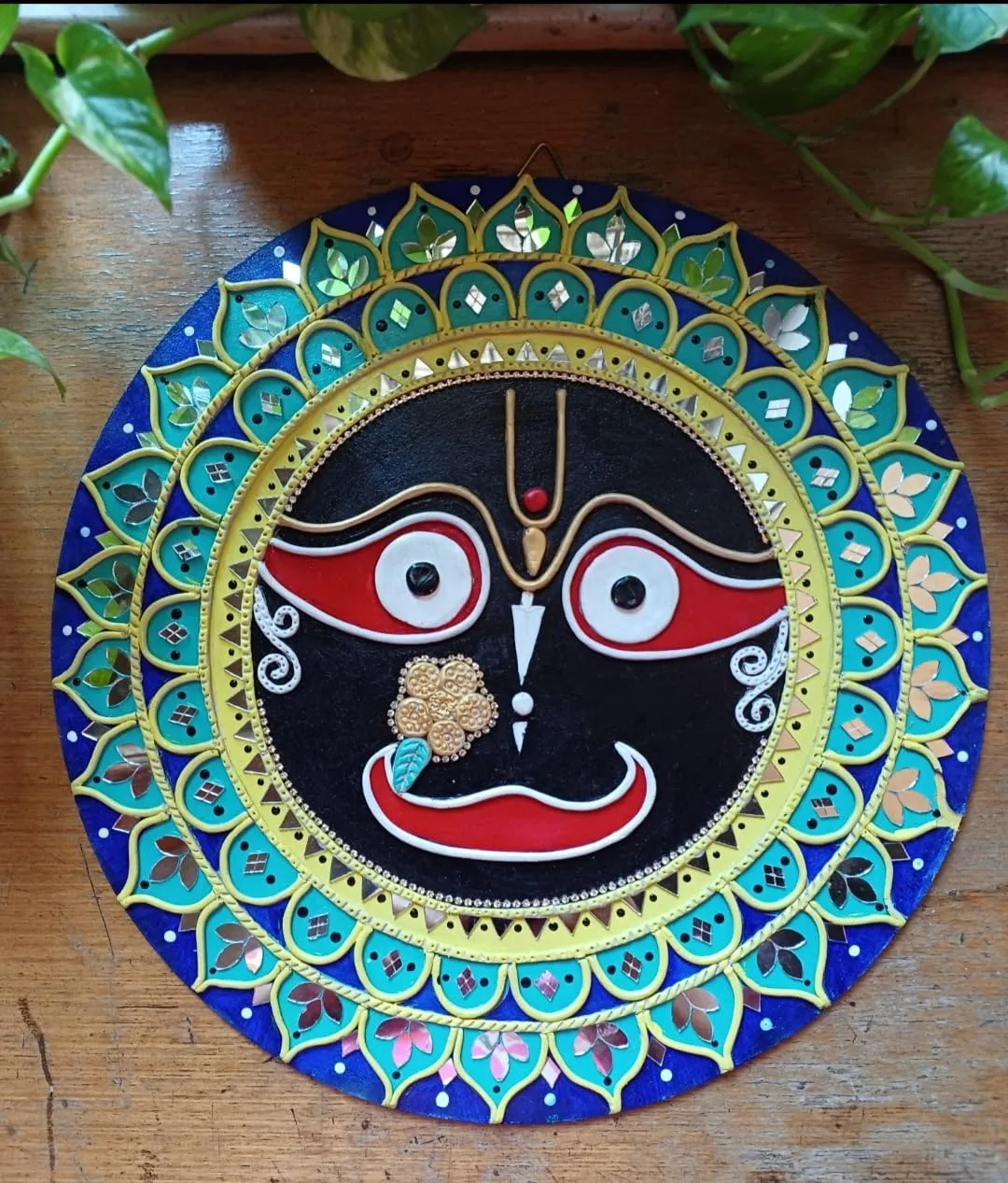 A Majestic Shreenathji Design on MDF Board with Mouldit Clay, Acrylic Paint, Mirrors – 12x12 Decorative Item